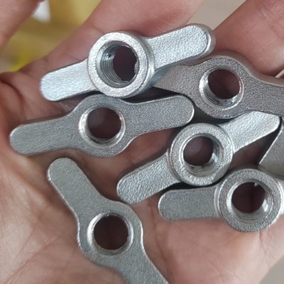 Material SS303 Nut de flanco de dos llaves con operación manual sin herramientas y molde personalizado de un tiro